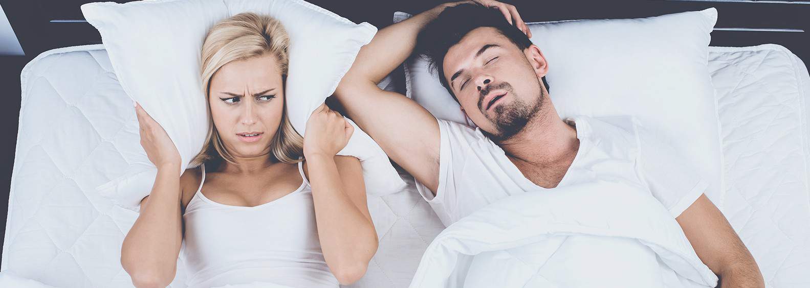 Couple tackling with snoring