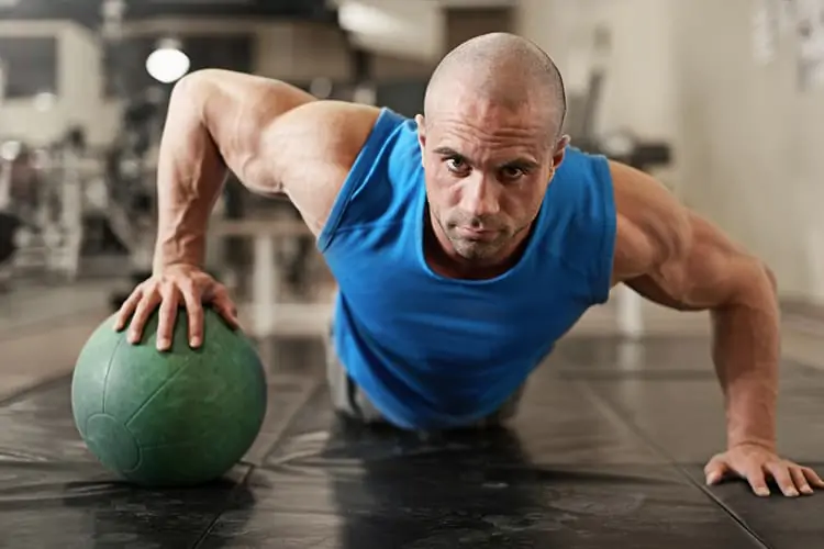 Best 5 Days Workout Split for Building Muscle - med ball pushups